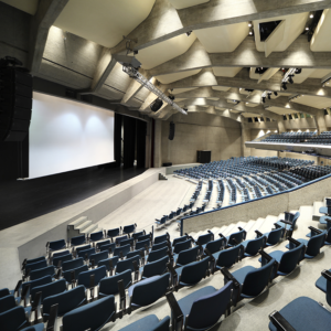 Large auditorium with projector screen